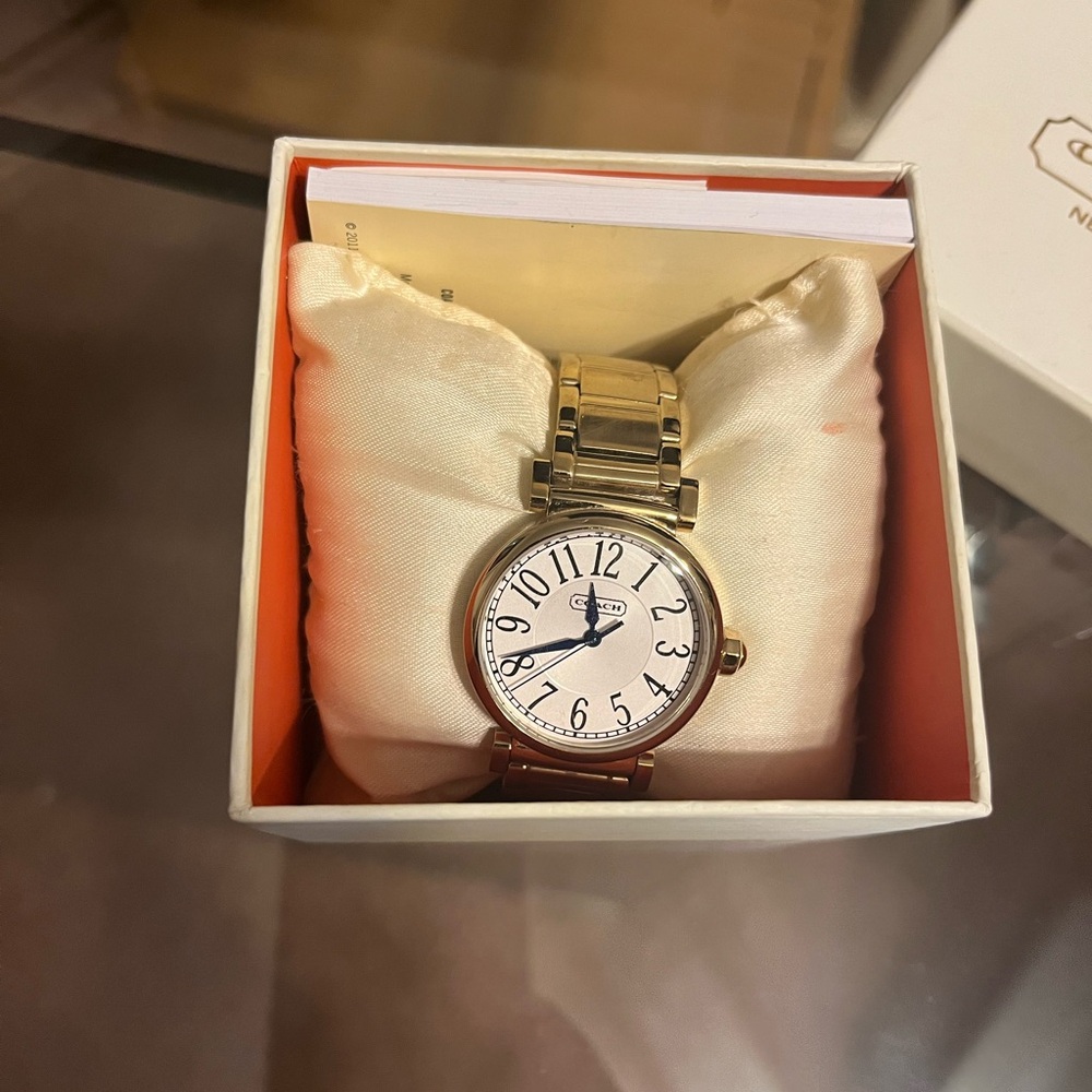 Authentic coach watch, gold with original tags and box